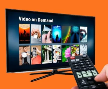 4K Smart TV Gadgets in modern living room with LED lights and minimalist decor, showcasing advanced home entertainment technology.