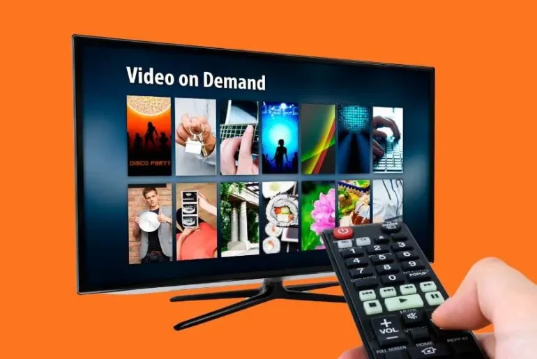 4K Smart TV Gadgets in modern living room with LED lights and minimalist decor, showcasing advanced home entertainment technology.